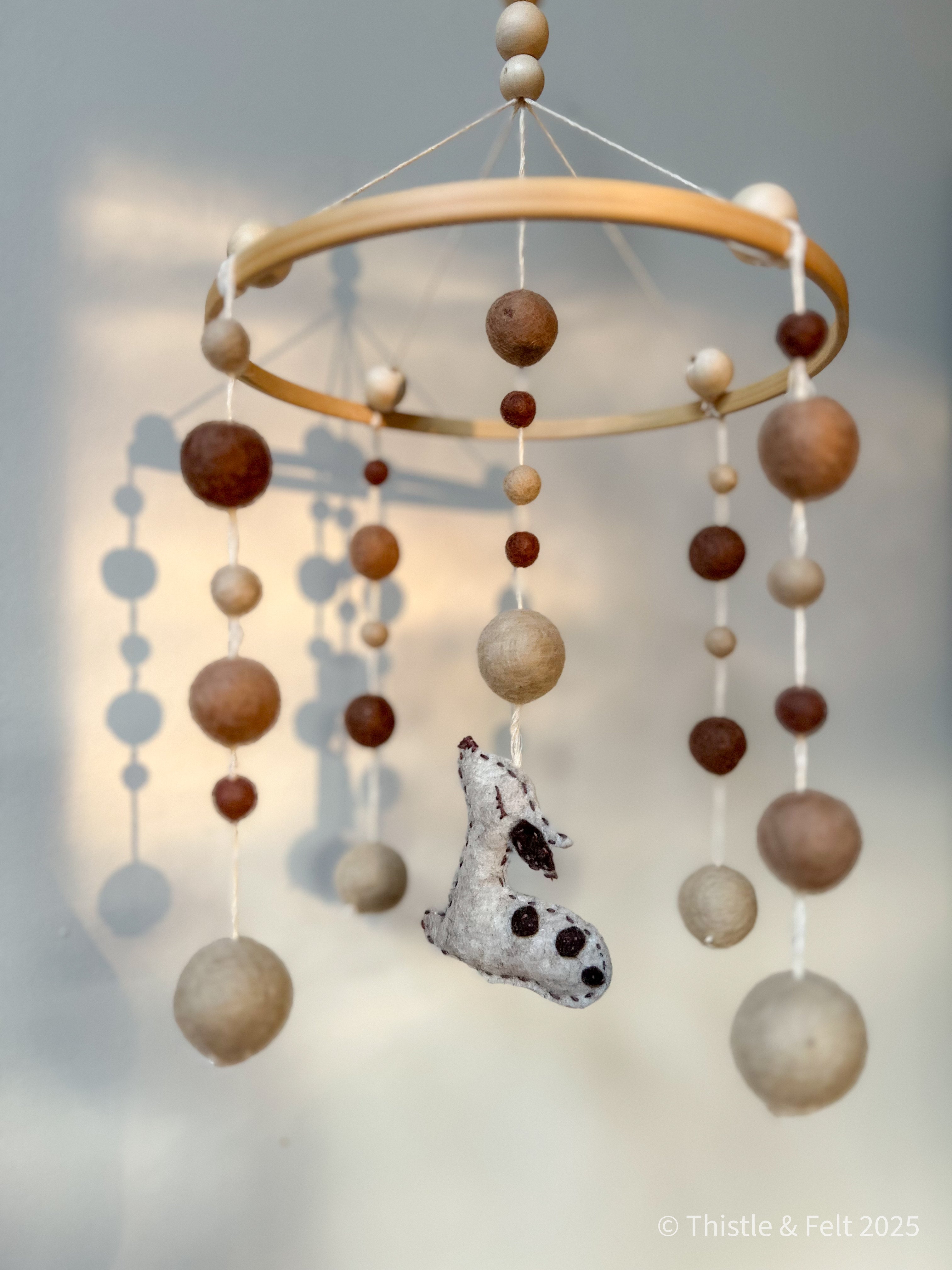 Sleeping fawn baby mobile made from pure wool felt with bamboo hoop and cotton twine, crafted for natural nurseries by Thistle & Felt