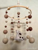 Sleeping fawn baby mobile made from pure wool felt with bamboo hoop and cotton twine, crafted for natural nurseries by Thistle & Felt