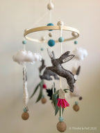 Handmade bunny felt nursery mobile with clouds by Thistle & Felt, perfect for natural nursery décor.